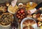 Feast, Easter food, treats with Easter cakes and colored eggs.Hands of people eating food at the table