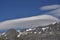 Feathery Cirrus cloud over mountains