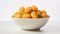 featuring Potato Croquettes elegantly arranged in a white bowl against a pristine white background, the golden brown