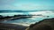 FEBRUARY/02/2019 Waves jumping on dock of the fishing cove of La Santa in Lanzarote during a storm, long exposure photography