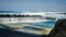 FEBRUARY/02/2019 Waves jumping on dock of the fishing cove of La Santa in Lanzarote during a storm, long exposure photography