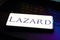 February 16, 2023, Brazil. In this photo illustration the Lazard logo seen displayed on a smartphone