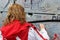 February 20 2018, Belfast Northern Ireland: Editorial photograph of a women signing the peace wall that is situated in