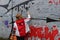 February 20 2018, Belfast Northern Ireland: Editorial photograph of a women signing the peace wall that is situated in