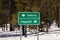 FEBRUARY, 2019 - WESTERN STATES - USA - Americana Roadside America shows Sign to Flagstaff and Sedona in snow