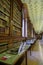 February 2021 Parma, Italy: Interior, stairs, shelves full of ancient books of the Biblioteca Palantina, Library in Palazzo della