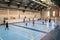 February 21, 2019. Denmark. Copenhagen. Team game with stick and ball Floorball or hockey in hall. Inside training in the gym of