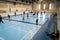 February 21, 2019. Denmark. Copenhagen. Team game with stick and ball Floorball or hockey in hall. Inside training in the gym of