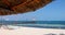 February 25, 2023: Small hut on a wooden pier at Cancun beach, Cancun is one of the leading tourist destinations in entire Latin