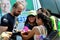 Federal Deputy Eduardo Bolsonaro autographing the T-shirt of the electoral campaign