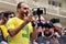 Federal Deputy Eduardo Bolsonaro at the microphone on the podium at the demonstration for the printed and auditable vote