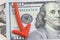 Federal Reserve, FED emblem on US dollar banknote money with red pointing down arrow using as interest rate cut policy or US