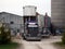 Feed being delivered at a pig farm