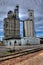 Feed silos where cattle feed is made, packaged and stored