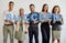 Feed your need to succeed. a group of young businesspeople holding letters that spell out the word succeed.