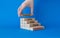 Feedback symbol. Wooden blocks with words Thank you for your Feedback. Beautiful blue background. Businessman hand. Business and