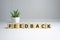 FEEDBACK word made with building blocks on white background