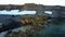 Feeding base of walruses and people on shores of Arctic Ocean aero view.