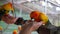 Feeding Colorful Parrots Sitting on Human Hand