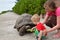 Feeding giant turtle