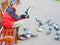 Feeding pigeons in Edinburgh: bird in the hand.