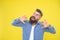 Feeling awesome. Beard fashion and barber concept. Man bearded hipster stylish beard yellow background. Barber tips