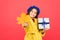 Feeling great. happy small girl with maple leaf and present box. girl child in french beret hold gift. Autumn weather