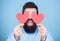 Feeling love. Dating and relations concept. Happy in love. Love is amazing. Man bearded hipster with heart valentine