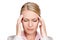 Feeling the pressure. Studio shot of a businesswoman looking stressed against a white background.