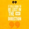 It Feels Good To Be Lost In The Right Direction - Motivational and inspirational quote on a yellow rustic grunge background