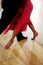 Feet of Argentinian tango dancers on a dancing parquet