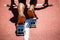 Feet of an athlete on a starting block about to run