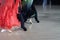 Feet of balroom dancers on a competition floor