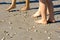 Feet on the beach at summer