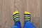 Feet of child in striped socks