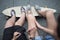 Feet couple of teenagers on the longboard closeup