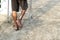 The feet of an elderly man disabled, walk with a crutch