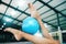 Feet, gymnastics and woman with ball for competition, practice or event training. Closeup, sports and barefoot female