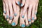 Feet and hands with creative teens manicure