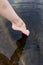 Feet immersed in the clear water, Feet in water. Selfie of legs and barefoot. Vacation at summer holiday