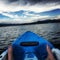 Feet in kayak in water