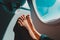 Feet of little girl travel by plane, child in flight, safety