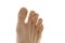 Feet of a man isolated on white background with brocken nails on toes which need a pedicure and nail polish