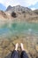 Feet in mountain lake Eissee, Hohe Tauern Alps, Austria