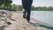 Feet running on sandy beach