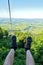 Feet in running shoes closeup. The chair lift over the mountains