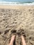 Feet in the sand