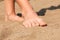 Feet on sand