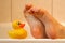 Feet taking with bath duck