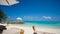 Feet tourist relax at Maldives turquoise sea white sand tropical beach paeadise